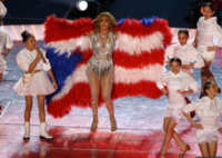 J.Lo and her daughter Emme performing. Photo obtained from Elle.com